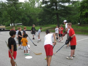 DeGemmis' youth street hockey camps help kids learn the basics, like passing, shooting, and stickhandling